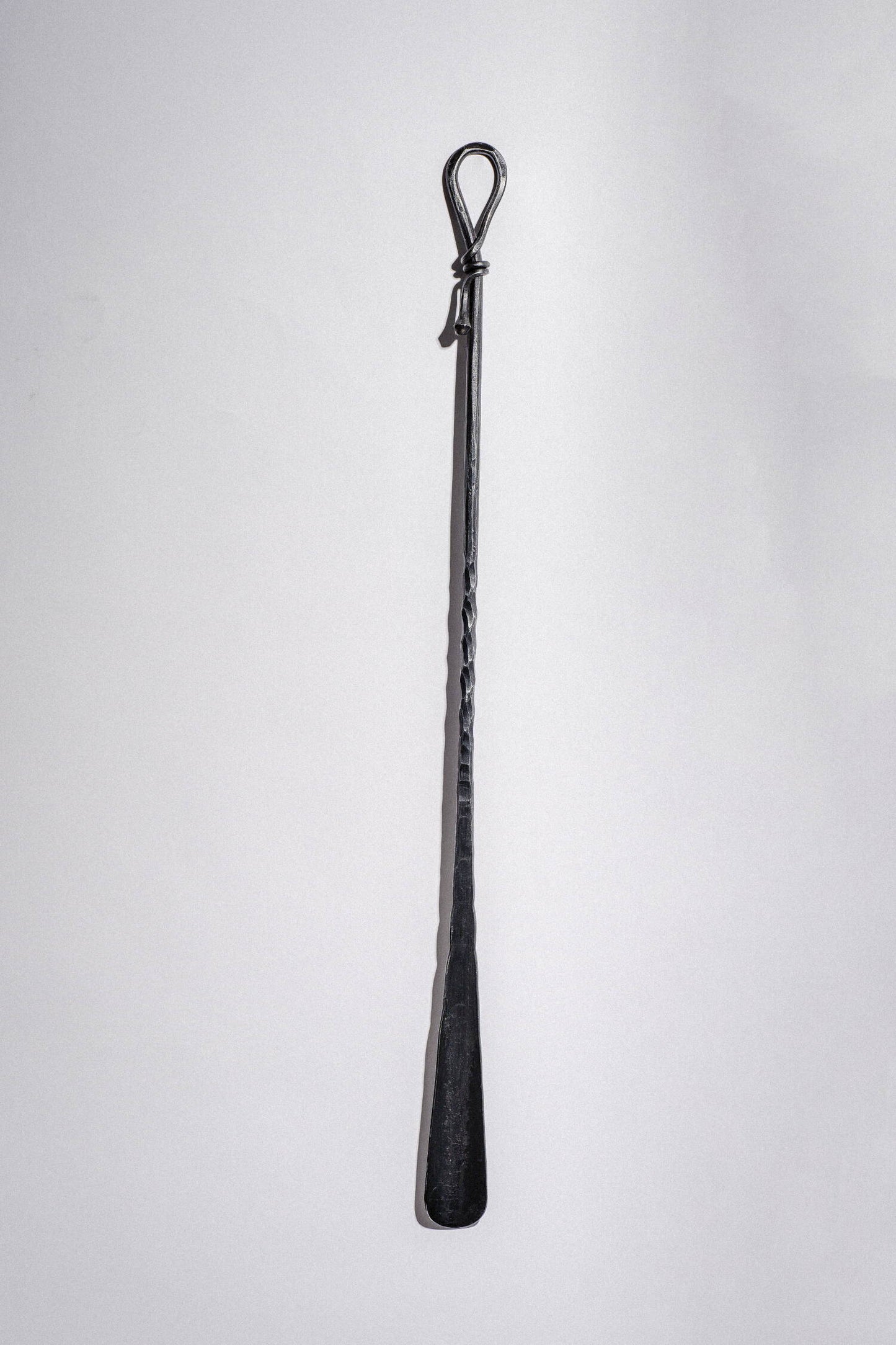 Der Schuhlöffel mit Griff